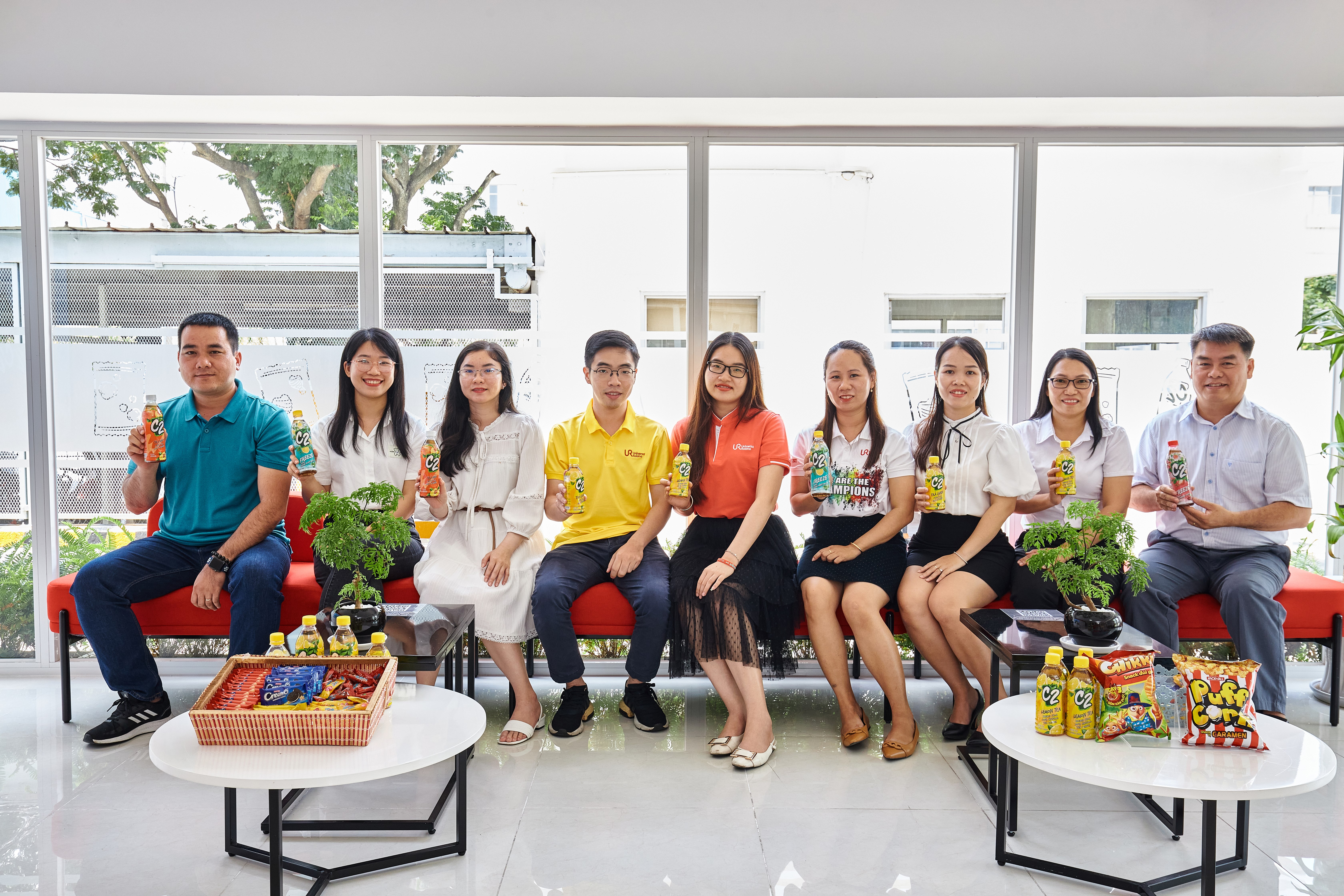 A group of people sitting on chairsDescription automatically generated